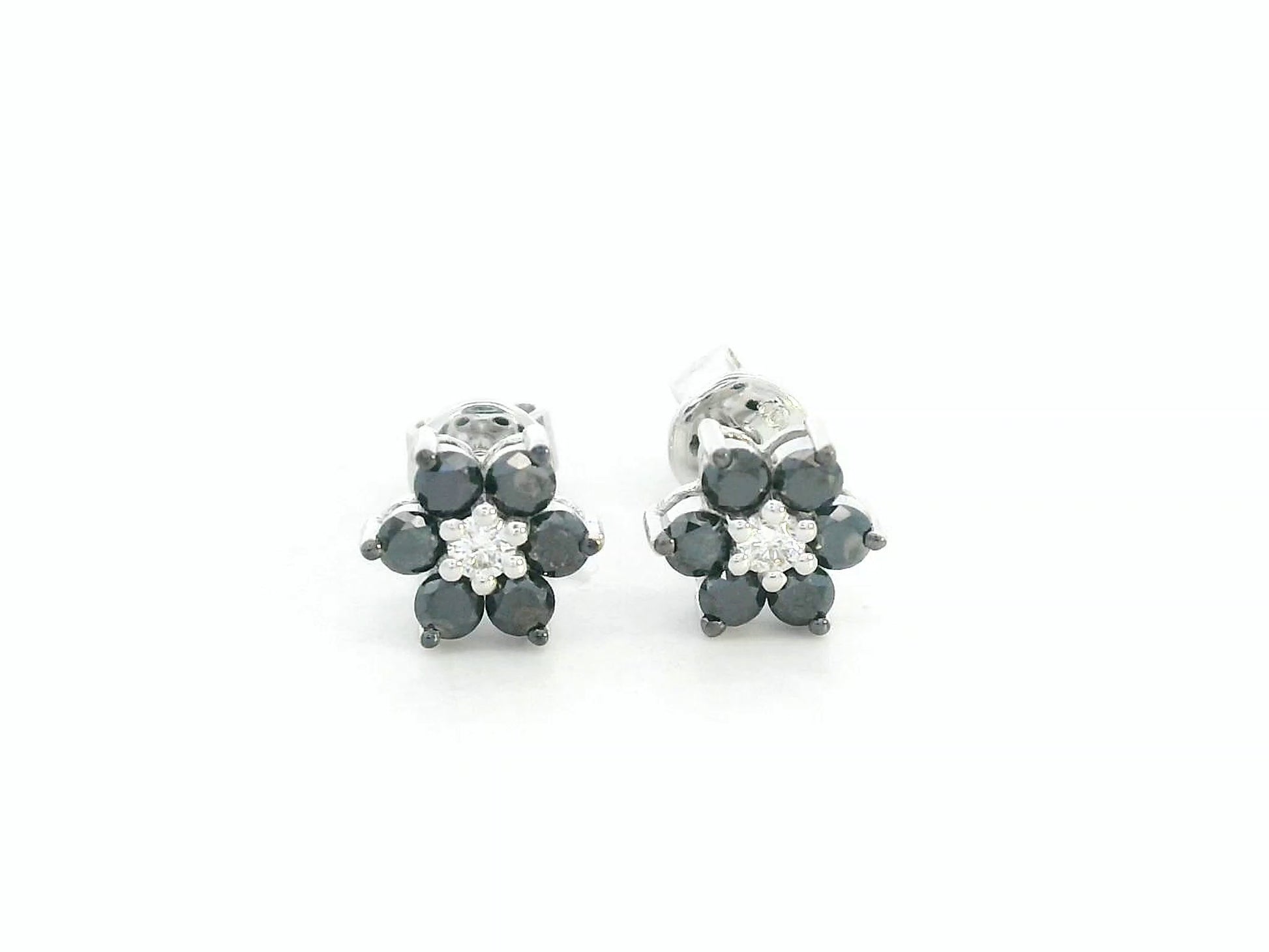 Luxury 18K white gold earrings featuring black diamonds