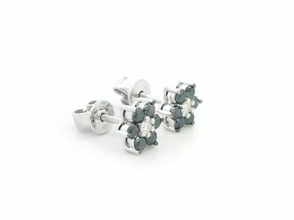Bold black and white diamond earrings in a floral design