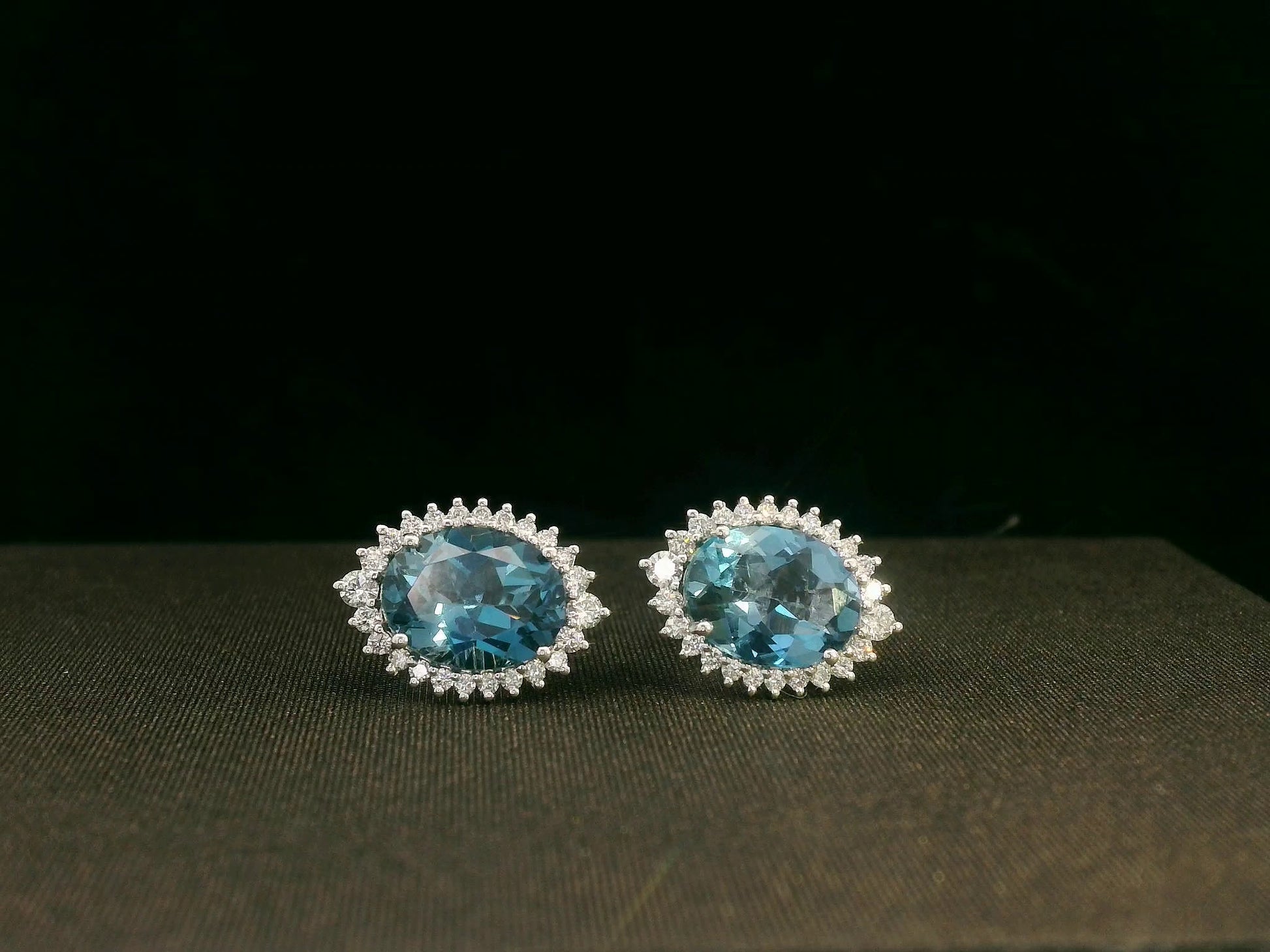 18k white gold London Blue Topaz and diamond halo earrings