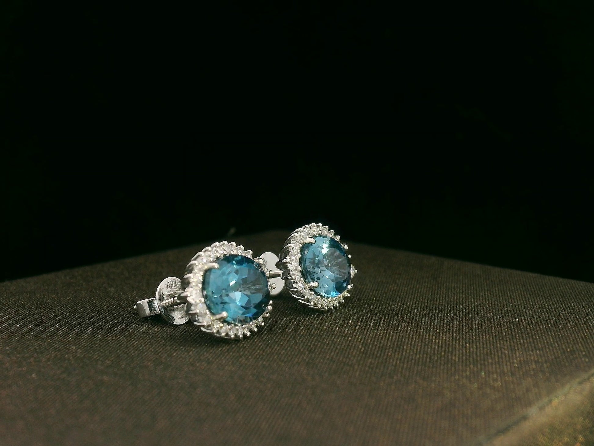 18k white gold London Blue Topaz and diamond halo earrings