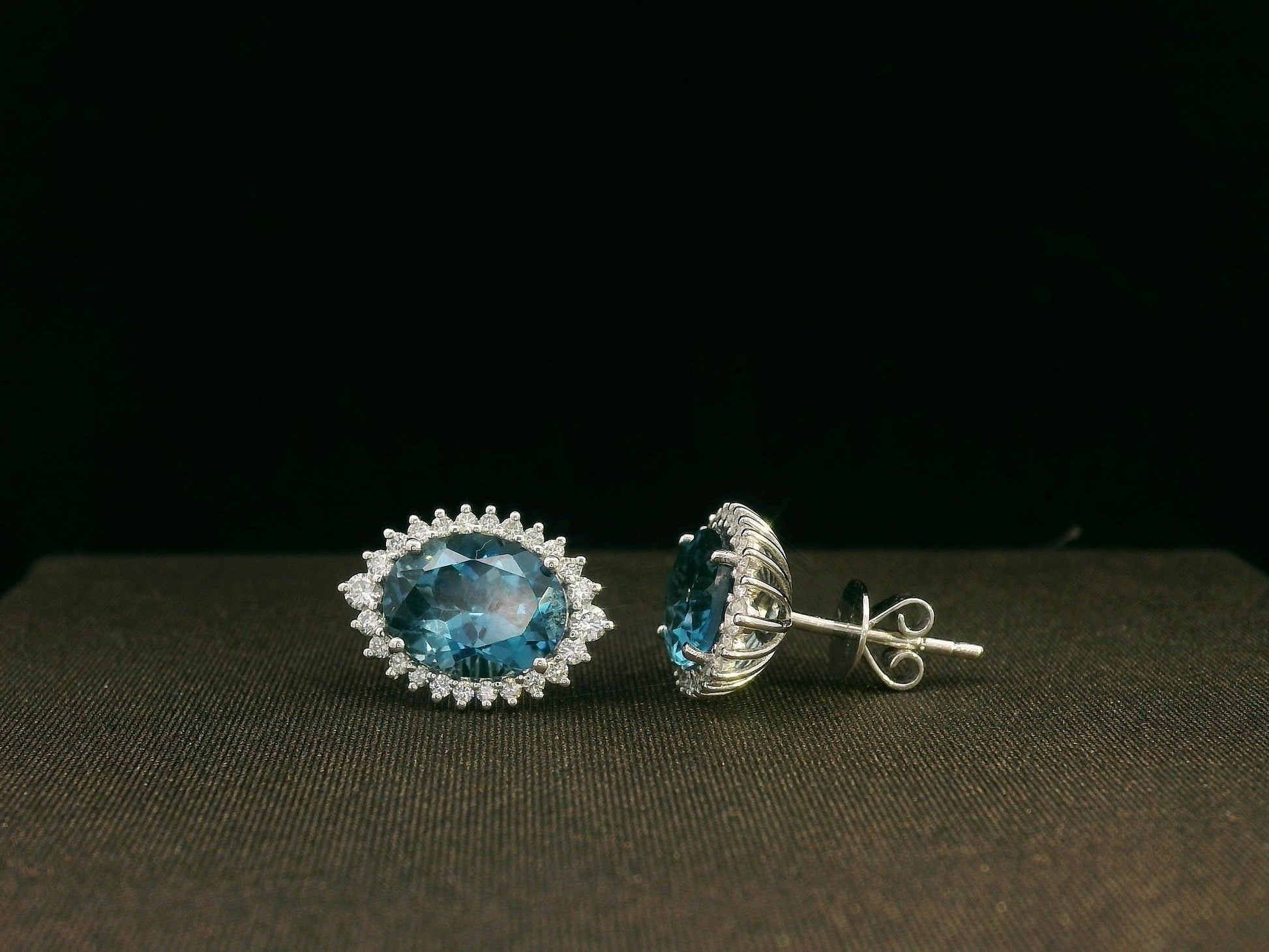 18k white gold London Blue Topaz and diamond halo earrings