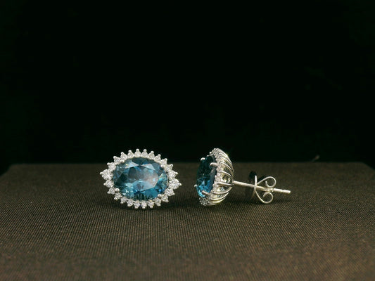 18k white gold London Blue Topaz and diamond halo earrings