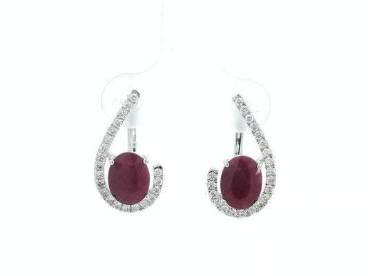 Front view of 18k white gold earrings with oval rubies totaling 2.96 carats and 0.38 carat pave diamonds, latch-back closure