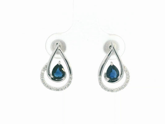 18k white gold teardrop earrings with pear-cut blue sapphires totaling 0.73 carat and 0.15 carat diamonds in partial halo