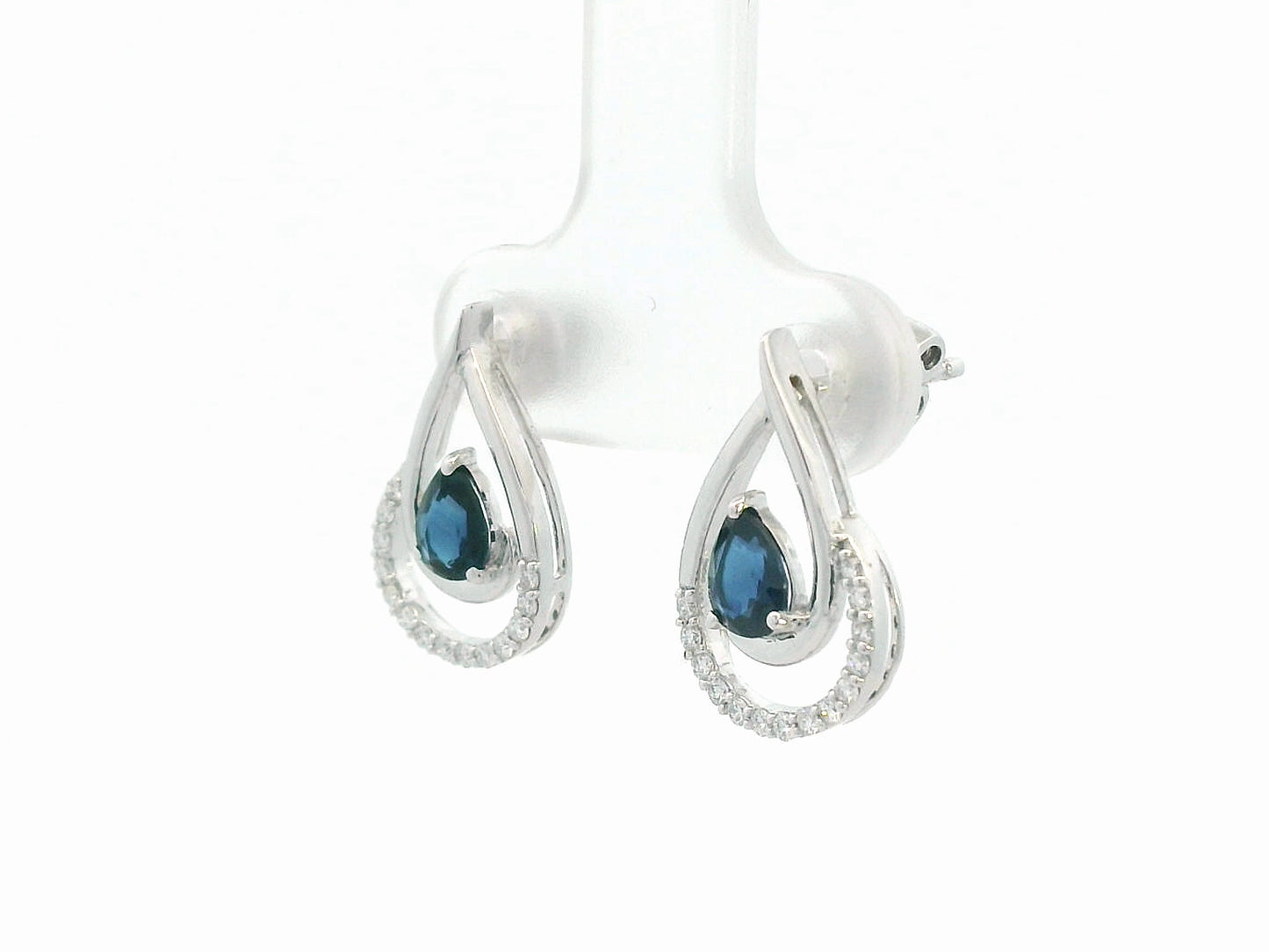 18k white gold teardrop earrings with pear-cut blue sapphires totaling 0.73 carat and 0.15 carat diamonds in partial halo