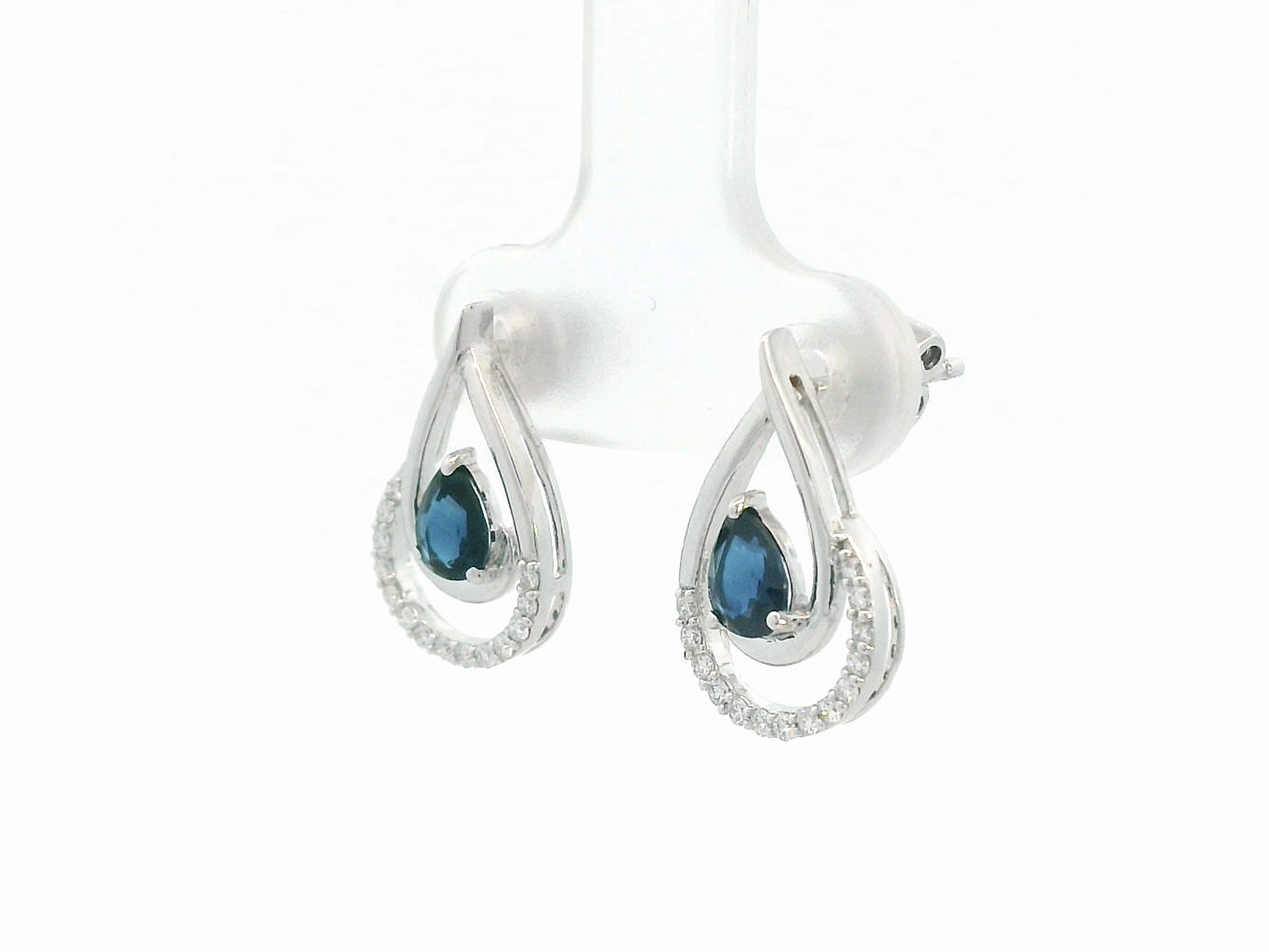 18k white gold teardrop earrings with pear-cut blue sapphires totaling 0.73 carat and 0.15 carat diamonds in partial halo