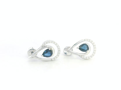 18k white gold teardrop earrings with pear-cut blue sapphires totaling 0.73 carat and 0.15 carat diamonds in partial halo