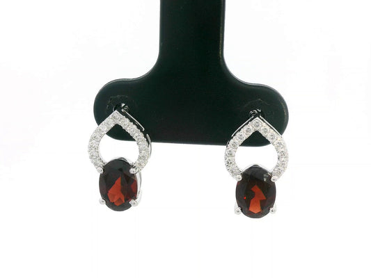 18k white gold stud earrings with oval garnets totaling 1.92 carat and 0.18 carat diamonds in open teardrop design