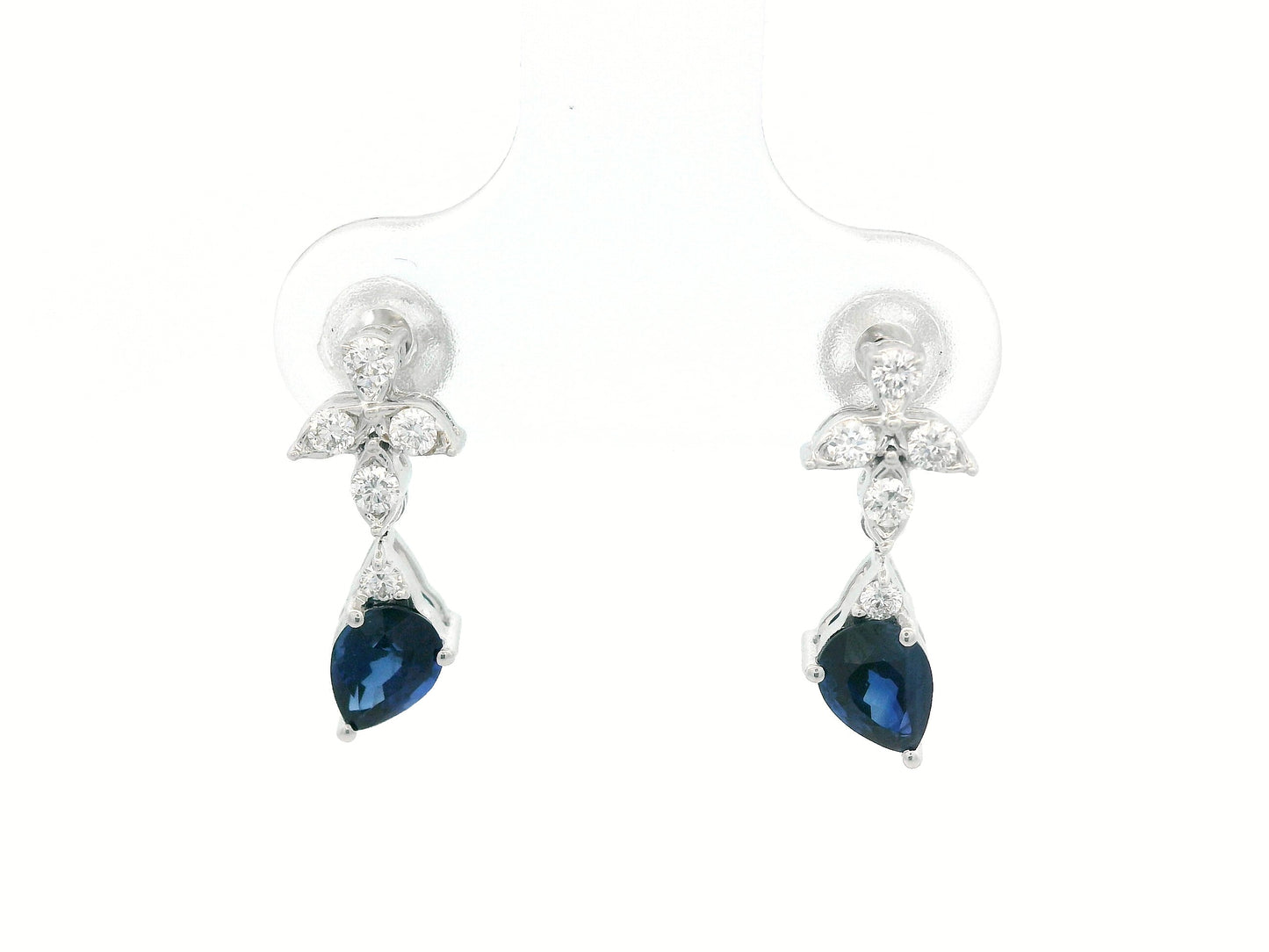 18k white gold floral stud earrings with 0.79 carat pear-cut blue sapphires dangling from 0.16 carat diamond clusters