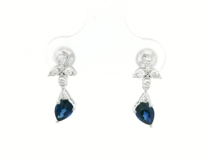 18k white gold floral stud earrings with 0.79 carat pear-cut blue sapphires dangling from 0.16 carat diamond clusters