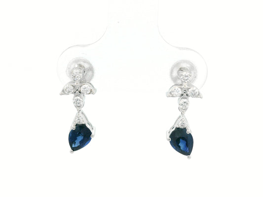 18k white gold floral stud earrings with 0.79 carat pear-cut blue sapphires dangling from 0.16 carat diamond clusters
