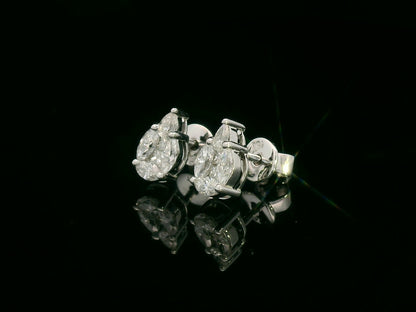 side view of 18k white gold stud earrings with pear, marquise, and princess-cut diamond cluster