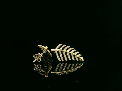 18K yellow gold leaf-shaped stud earrings with pavé diamonds, nature-inspired elegant design