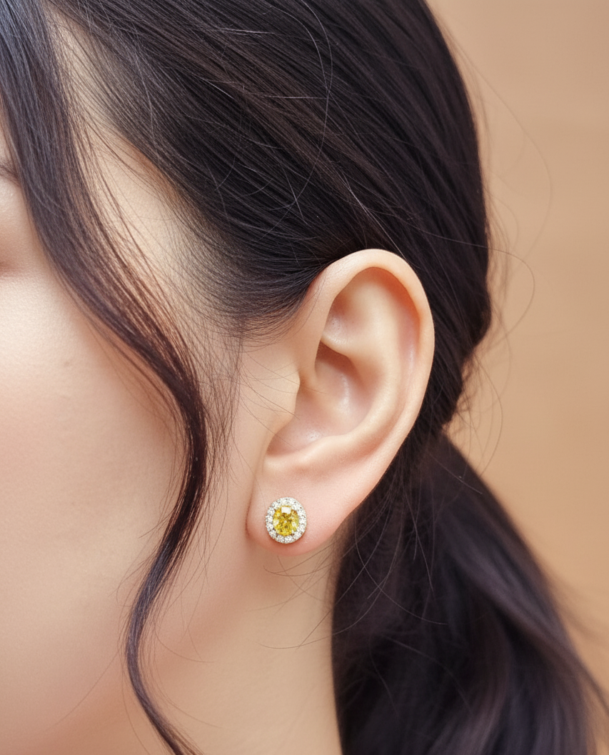 18K yellow gold yellow sapphire and diamond halo stud earrings – 1.69ct oval yellow sapphire with 0.32ct diamond halo, fine jewelry by Emirates Diamonds