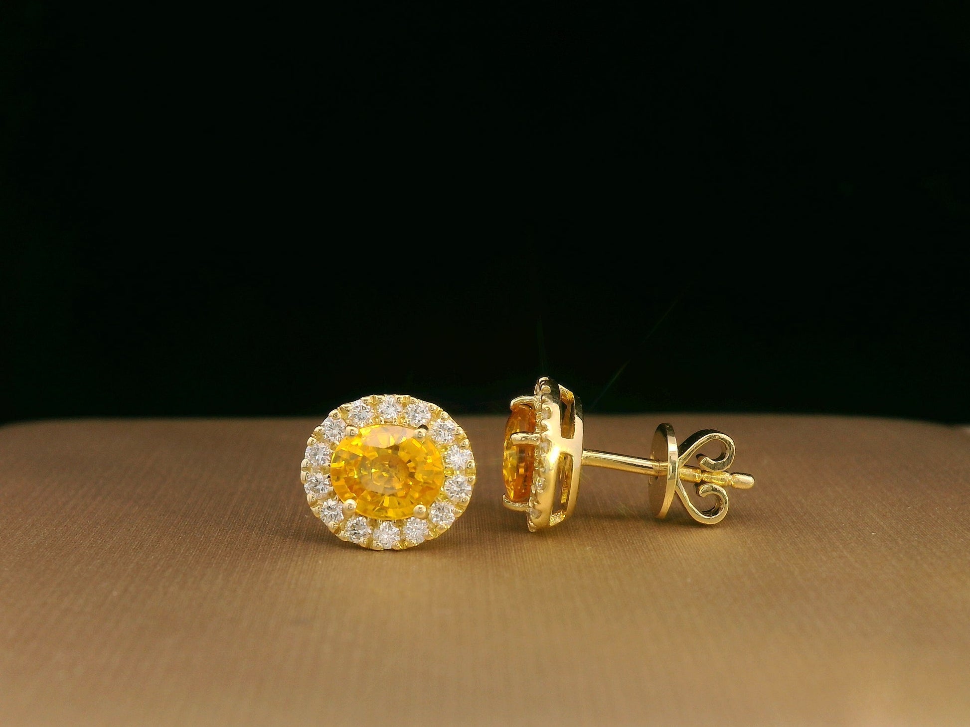 18K yellow gold yellow sapphire and diamond halo stud earrings – 1.69ct oval yellow sapphire with 0.32ct diamond halo, fine jewelry by Emirates Diamonds