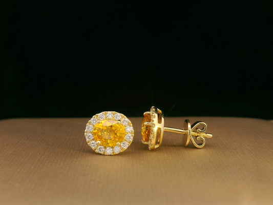 18K yellow gold yellow sapphire and diamond halo stud earrings – 1.69ct oval yellow sapphire with 0.32ct diamond halo, fine jewelry by Emirates Diamonds
