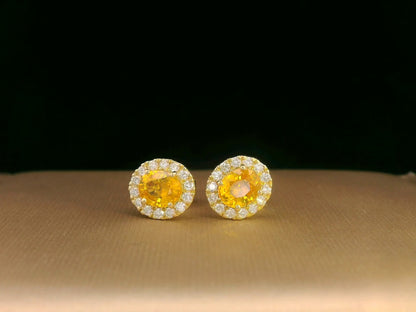 18K yellow gold yellow sapphire and diamond halo stud earrings – 1.69ct oval yellow sapphire with 0.32ct diamond halo, fine jewelry by Emirates Diamonds