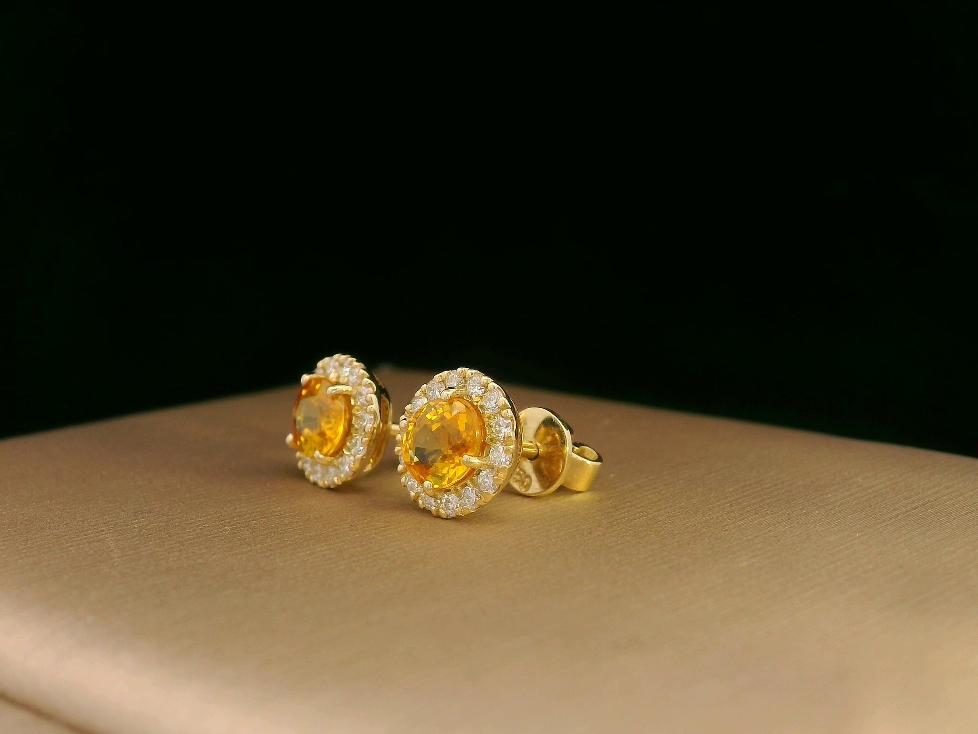 18K yellow gold yellow sapphire and diamond halo stud earrings – 1.69ct oval yellow sapphire with 0.32ct diamond halo, fine jewelry by Emirates Diamonds