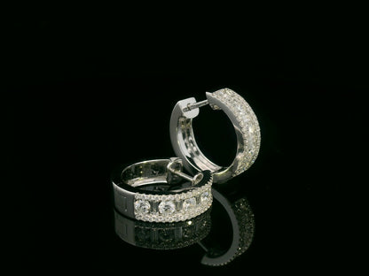 18K white gold geometric hoop earrings with baguette and round-cut diamonds, total 1.06ct