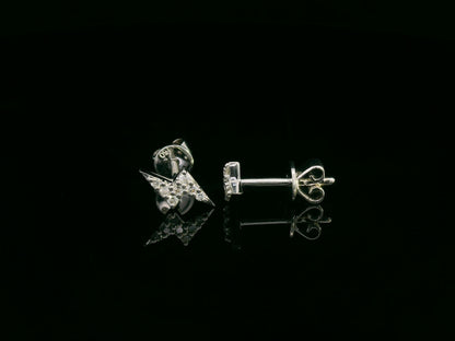 18K white gold geometric lightning bolt pavé diamond stud earrings – minimalist modern earrings by Emirates Diamonds.