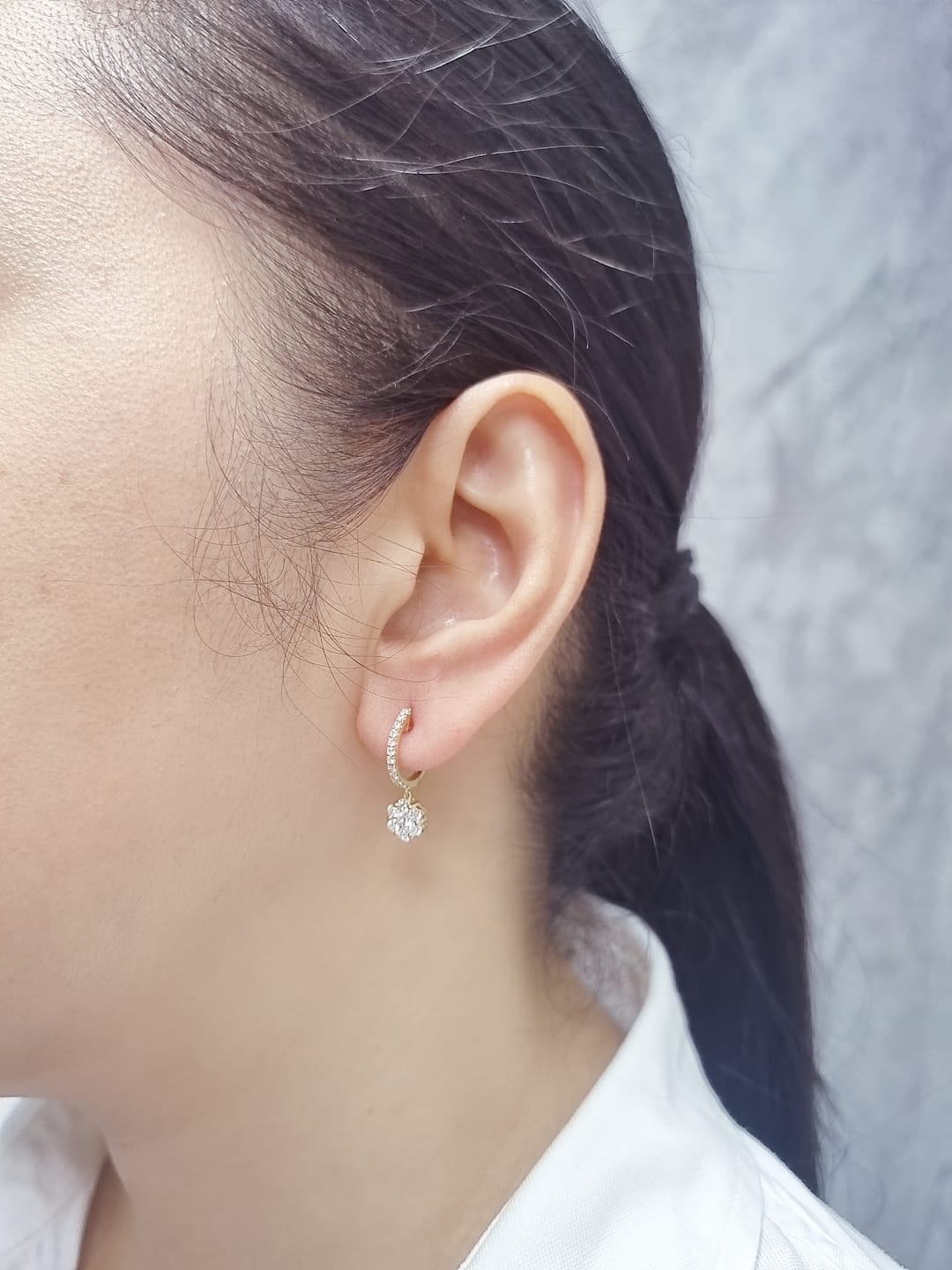 18K yellow gold hoop earrings with pavé-set diamonds and floral diamond drops, total 0.91 carat