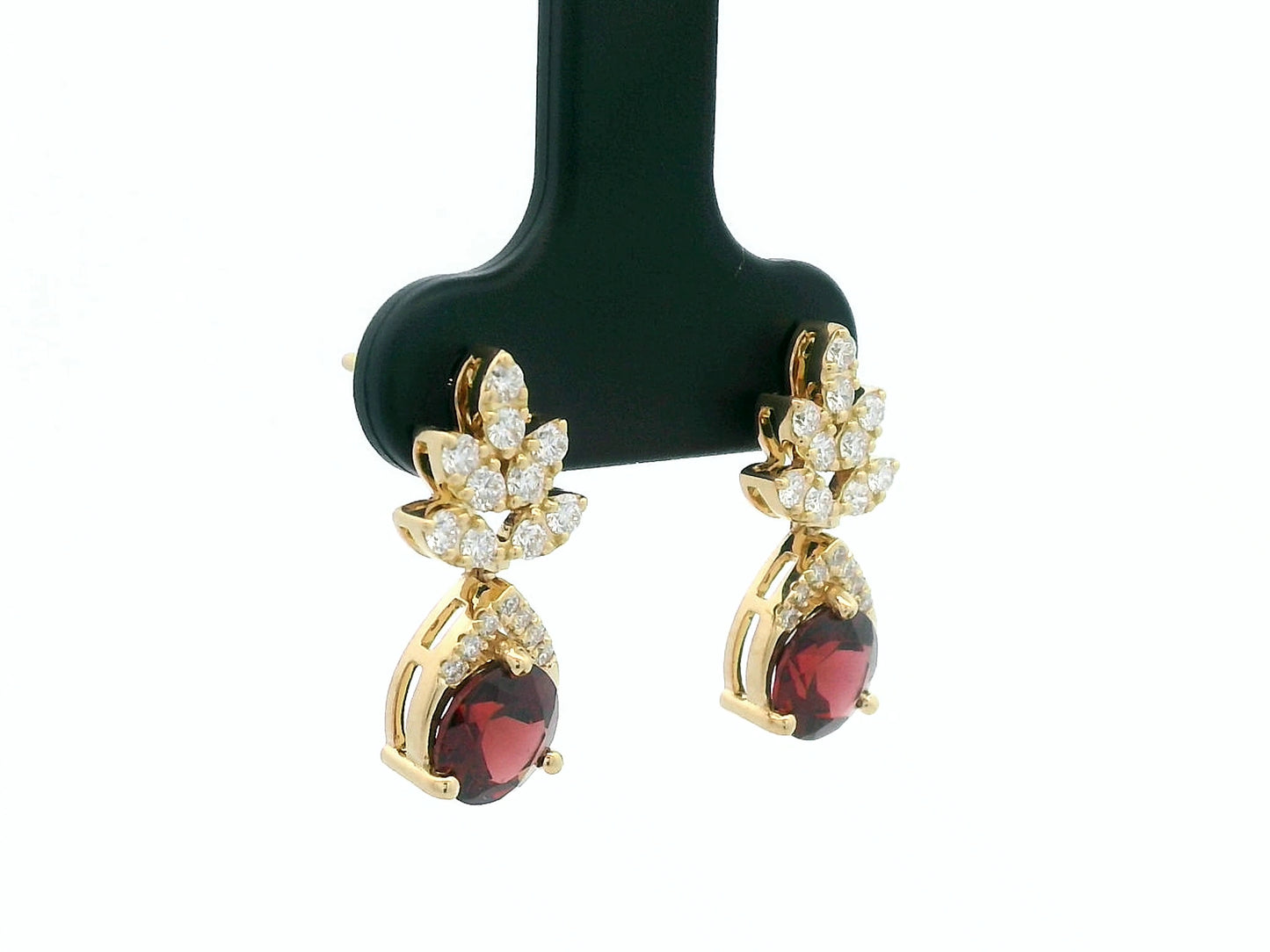 18K yellow gold leaf earrings with a toatl of 1.93ct round cut  garnets and 0.41ct pavé diamonds