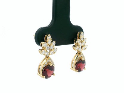 18K yellow gold leaf earrings with a toatl of 1.93ct round cut  garnets and 0.41ct pavé diamonds