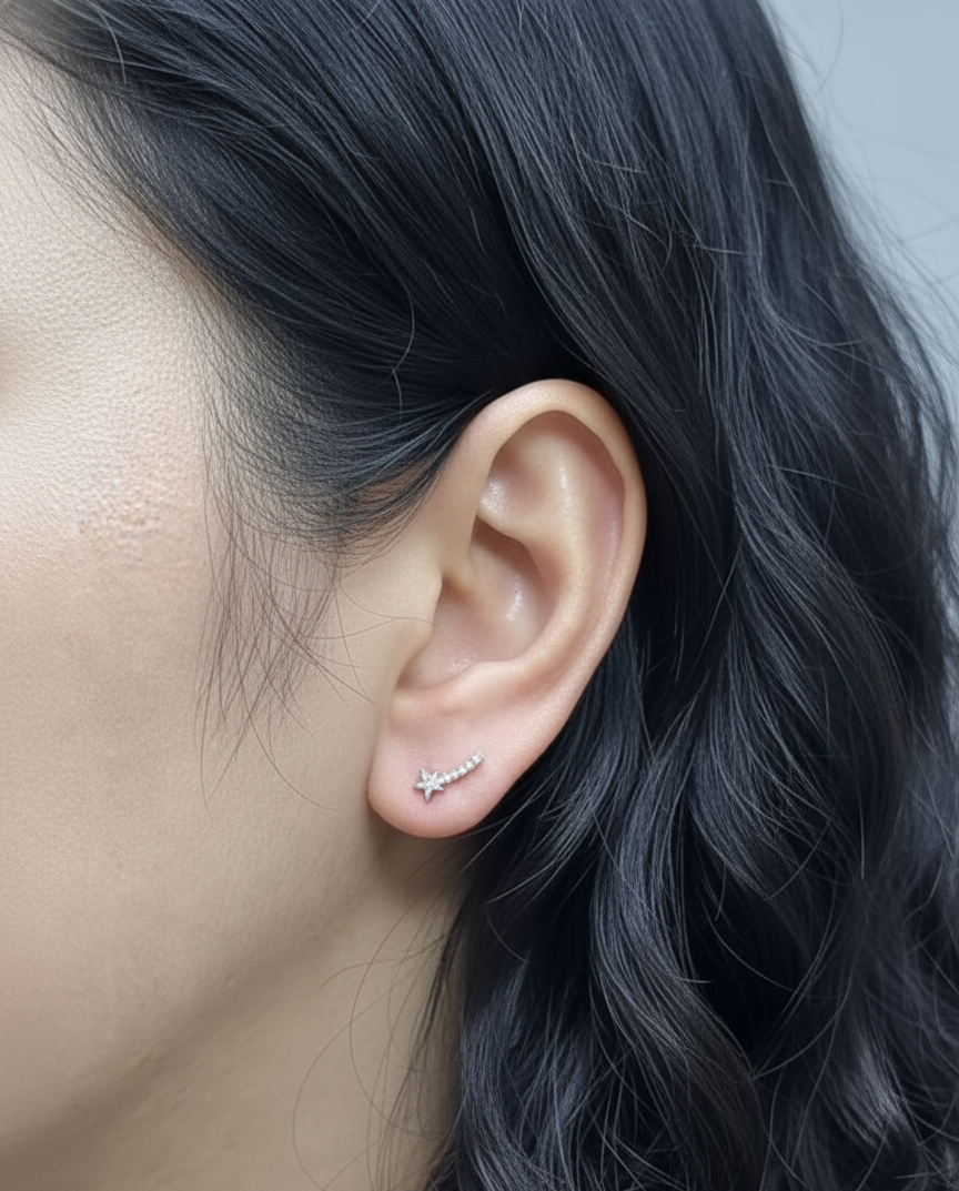 18K white gold shooting star earrings with 0.11 carat diamonds