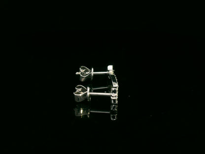 18K white gold shooting star earrings with 0.11 carat diamonds