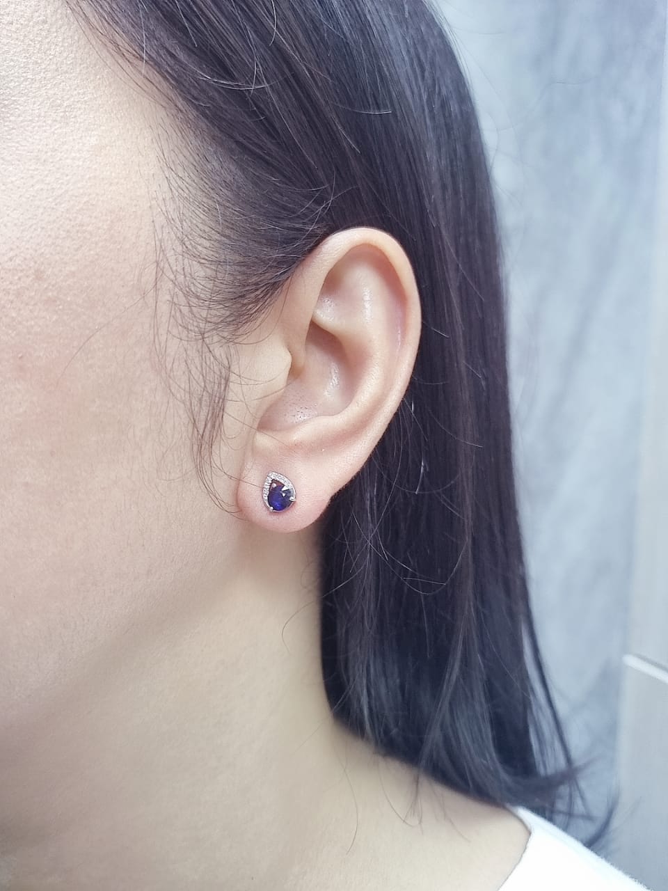 18K white gold teardrop halo stud earrings with round blue sapphires and diamonds