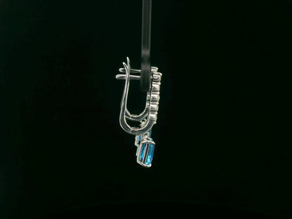 18K white gold dangle earrings with 2.32 ct emerald-cut blue topaz and 0.58 ct round diamonds