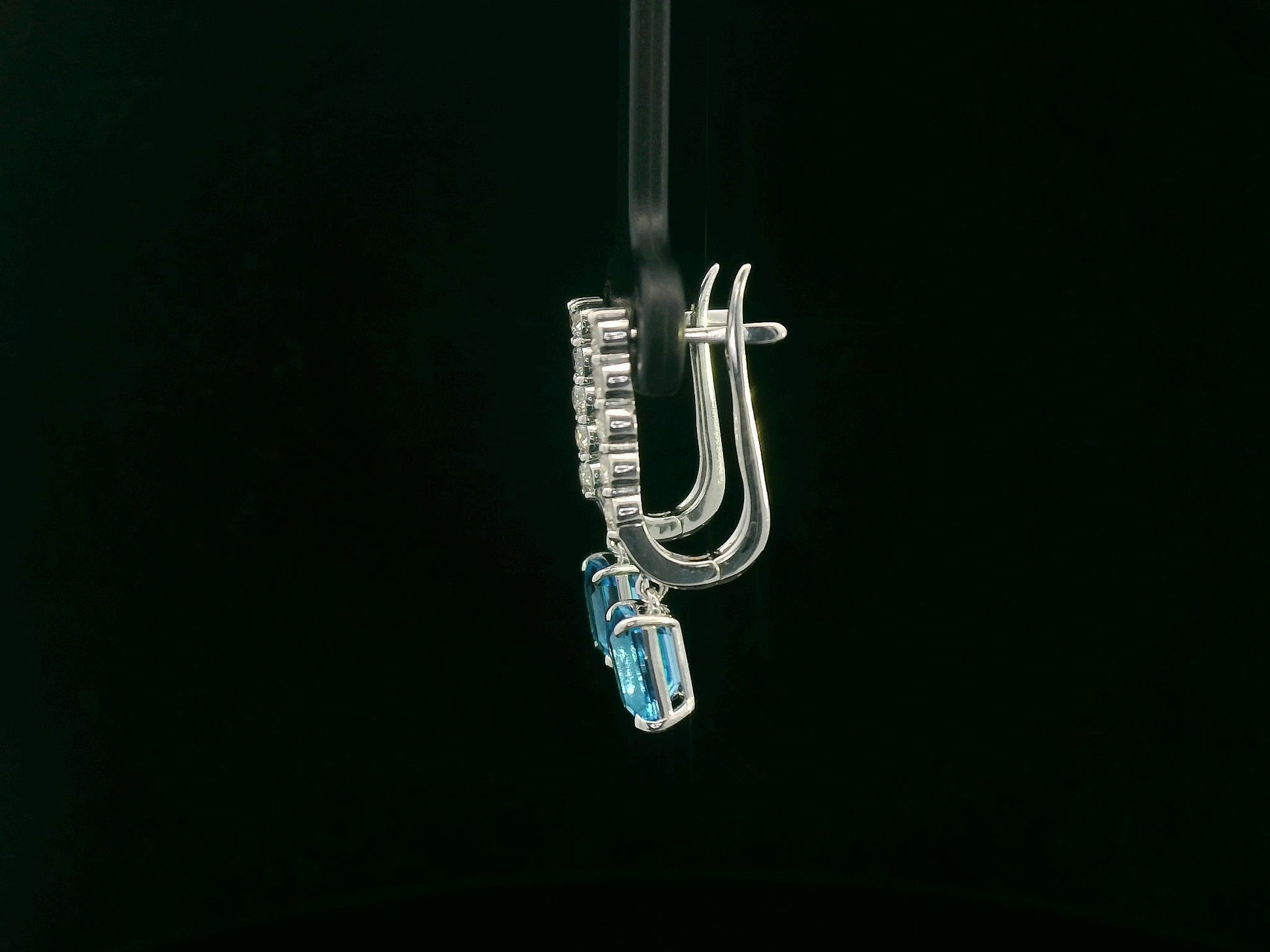 18K white gold dangle earrings with 2.32 ct emerald-cut blue topaz and 0.58 ct round diamonds