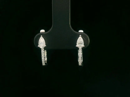 18K white gold hoop earrings with pear-shaped diamonds on top and diamond pavé front by Emirates Diamonds