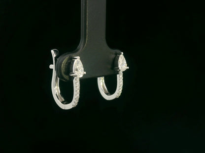 18K white gold hoop earrings with pear-shaped diamonds on top and diamond pavé front by Emirates Diamonds