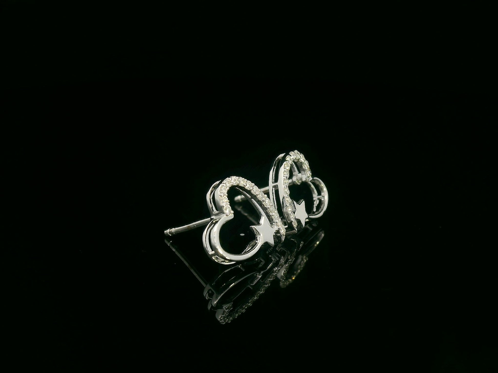 Diamond heart and star earrings in 18K white gold by Emirates Diamonds