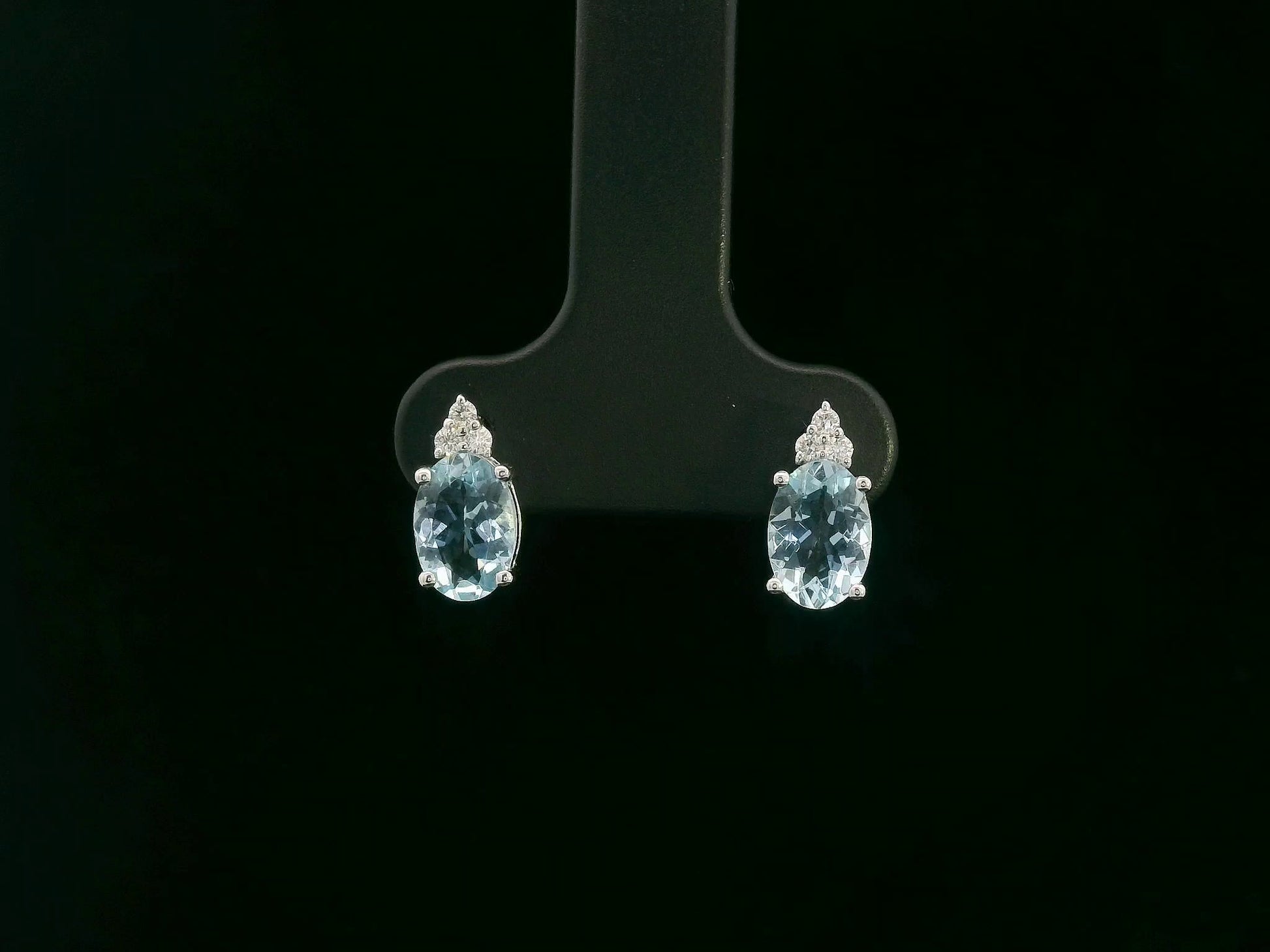Oval aquamarine and diamond cluster earrings in 18K white gold by Emirates Diamonds