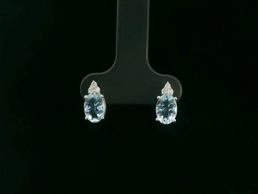 Oval aquamarine and diamond cluster earrings in 18K white gold by Emirates Diamonds