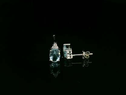 Oval aquamarine and diamond cluster earrings in 18K white gold by Emirates Diamonds