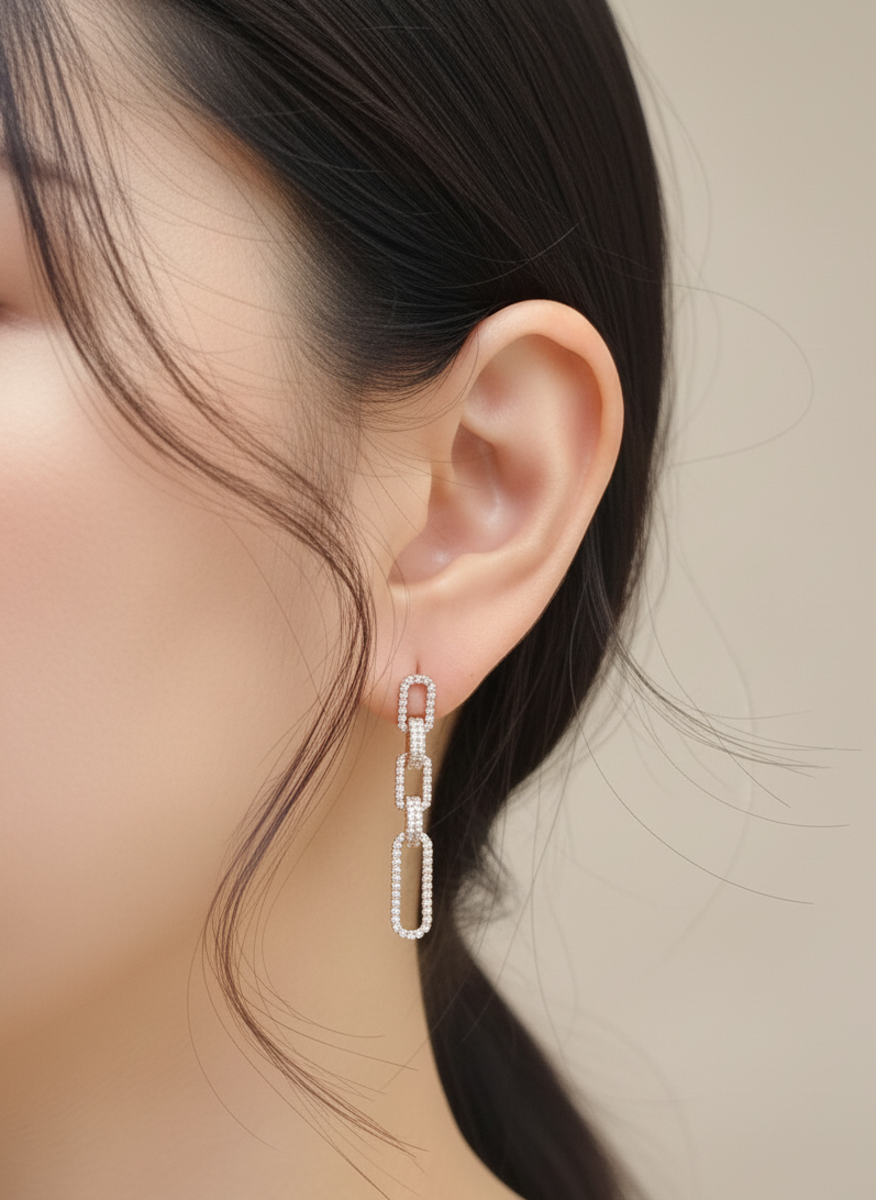 18K rose gold diamond link drop earrings featuring alternating polished and pavé-set links – 0.78ct total diamonds, Emirates Diamonds