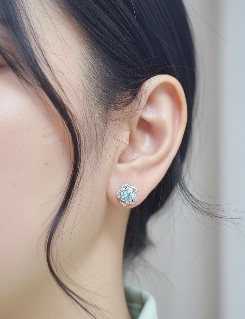 18K white gold aquamarine floral stud earrings – 1.03ct round aquamarine in sculpted flower setting, fine jewelry by Emirates Diamonds