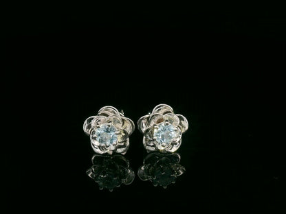18K white gold aquamarine floral stud earrings – 1.03ct round aquamarine in sculpted flower setting, fine jewelry by Emirates Diamonds