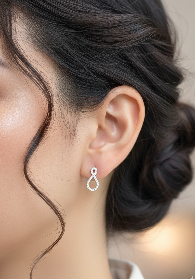 Diamond Infinity Stud Earrings in 18K White Gold