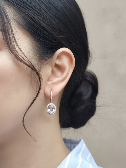 Oval morganite and diamond halo drop earrings in 18K rose gold with lever-back closure – Emirates Diamonds