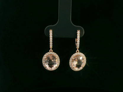 Oval morganite and diamond halo drop earrings in 18K rose gold with lever-back closure – Emirates Diamonds
