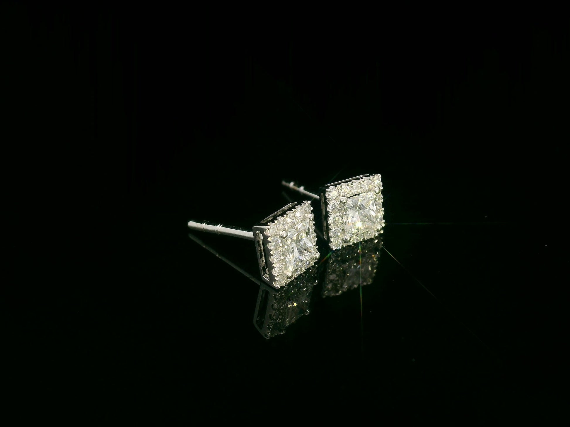 Princess-cut diamond halo stud earrings in 18K white gold — Emirates Diamonds