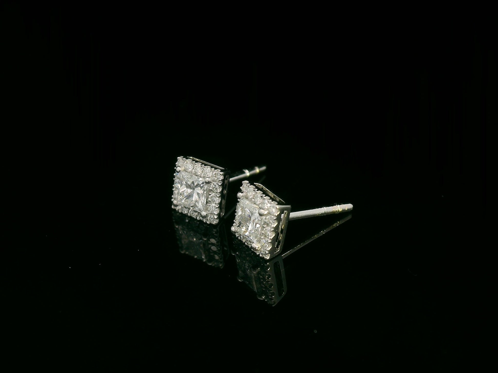 Princess-cut diamond halo stud earrings in 18K white gold — Emirates Diamonds