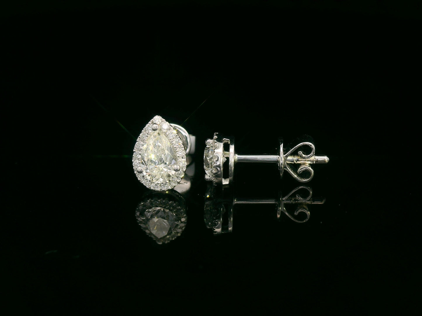 Pear-shaped diamond halo stud earrings in 18K white gold — Emirates Diamonds