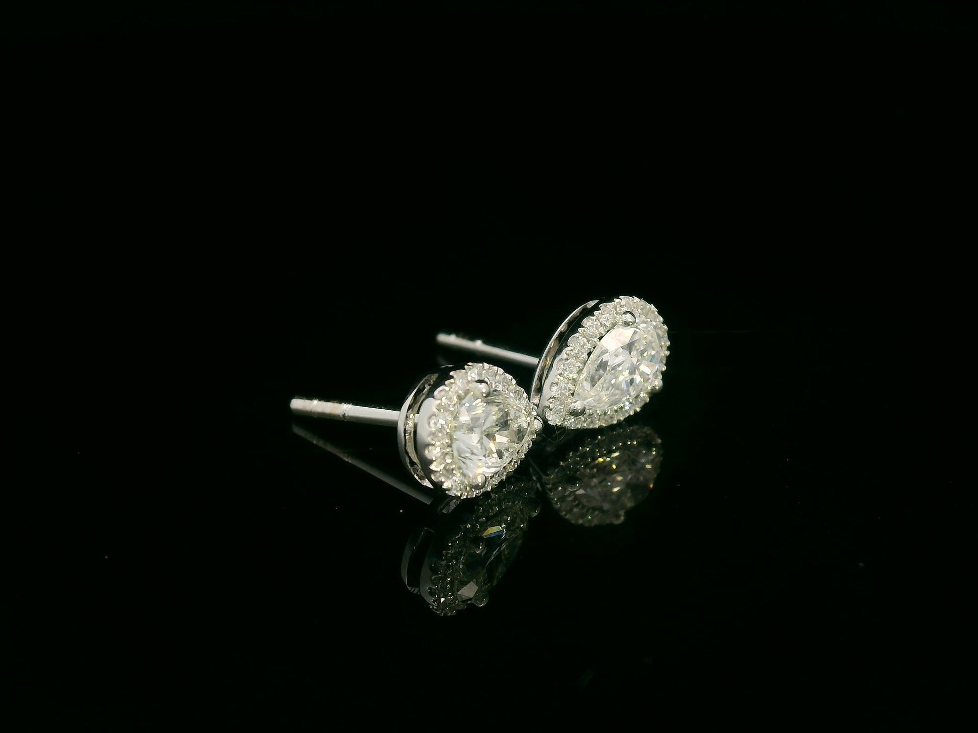 Pear-shaped diamond halo stud earrings in 18K white gold — Emirates Diamonds