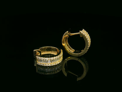 18K yellow gold diamond huggie hoop earrings – 0.57ct diamonds by Emirates Diamonds