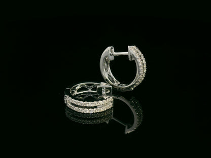 18K white gold diamond huggie hoop earrings – 0.23ct pavé diamonds by Emirates Diamonds
